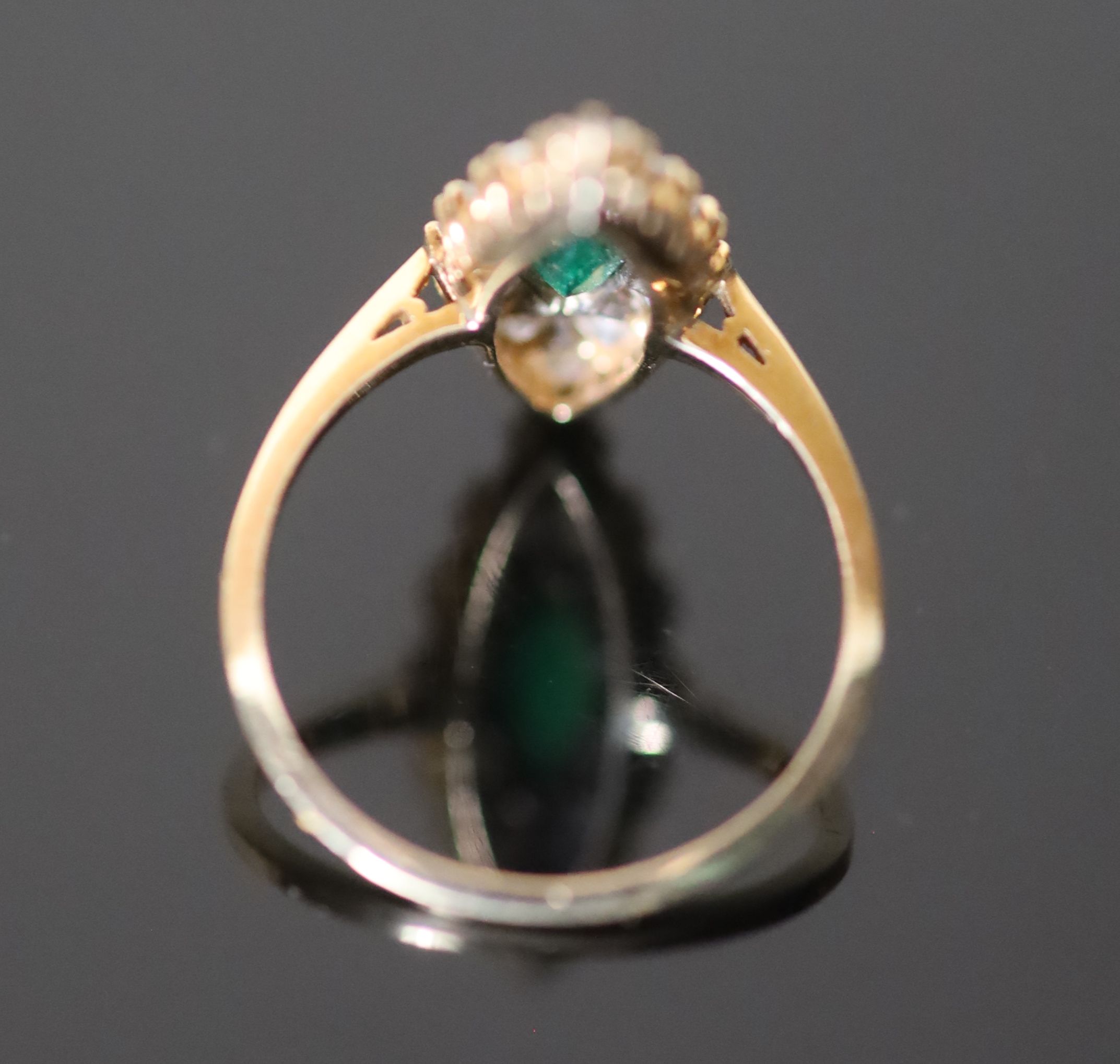 A Victorian style gold, emerald and diamond cluster set marquise shaped ring,
